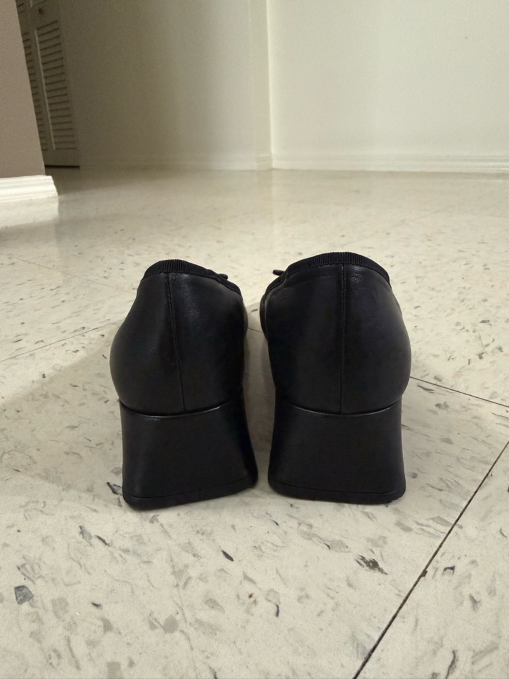Coach Black Leather Ballet Heels with Bow and Gold 'C' Accent - Picture 4 of 9